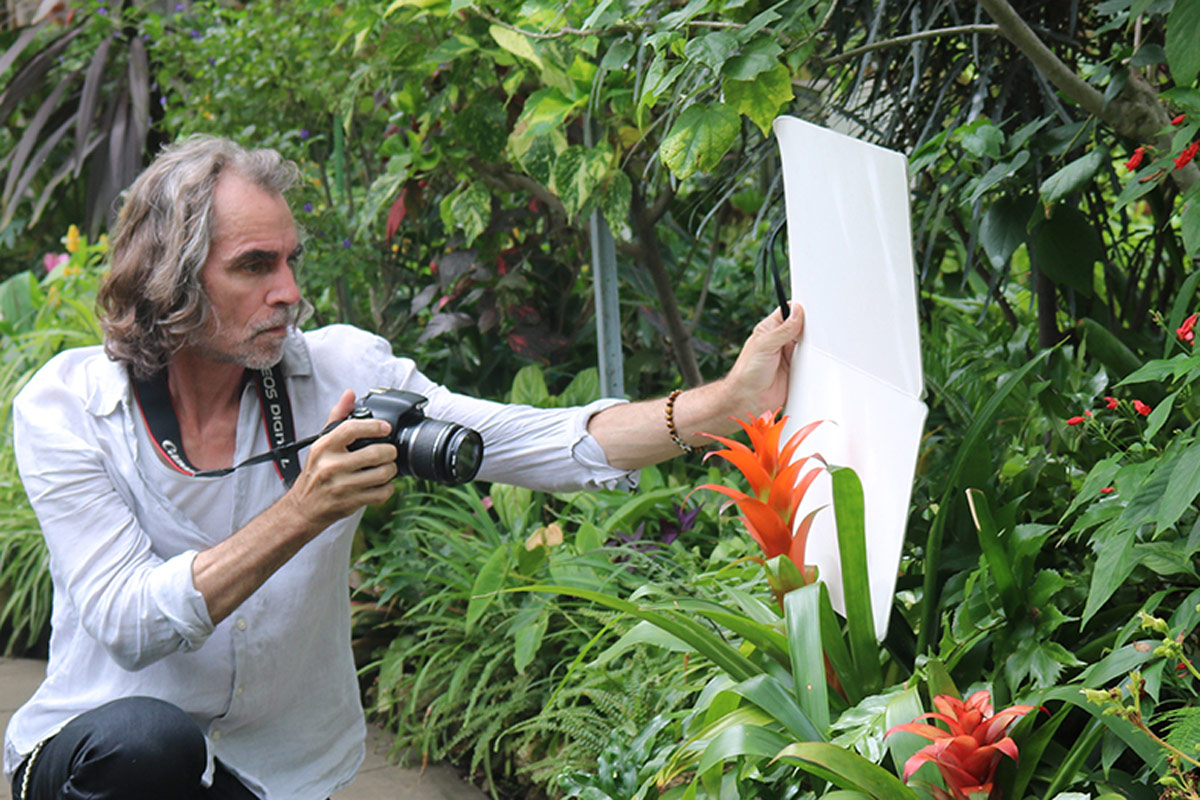Paul Cook photographing flowers